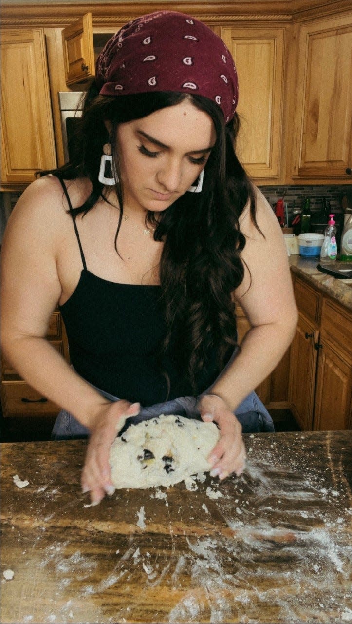 Brittany Khamille is best known as Britt Kham to her 1.5 million TikTok followers and now she's releasing her first cookbook.