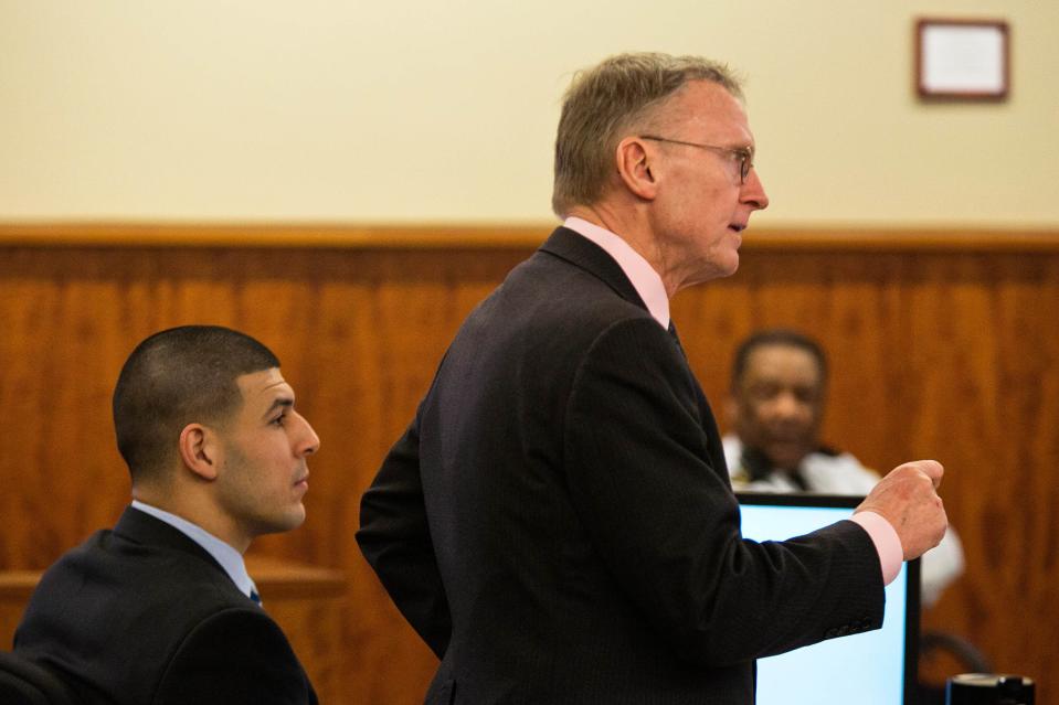 Attorney Charles Rankin (R) cross-examines a witness during the murder trial for former NFL player Aaron Hernandez (L) at the Bristol County Superior Court in Fall River, Massachusetts, February 17, 2015. REUTERS/Dominick Reuter (UNITED STATES - Tags: CRIME LAW)