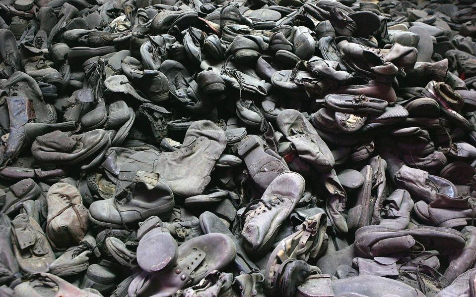 A mass of footwear removed from the men, women and children, taken at the Auschwitz Concentration Camp Museum. 