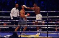 Britain Boxing - Anthony Joshua v Wladimir Klitschko IBF, IBO & WBA Super World Heavyweight Title's - Wembley Stadium, London, England - 29/4/17 Anthony Joshua in action with Wladimir Klitschko Action Images via Reuters / Peter Cziborra