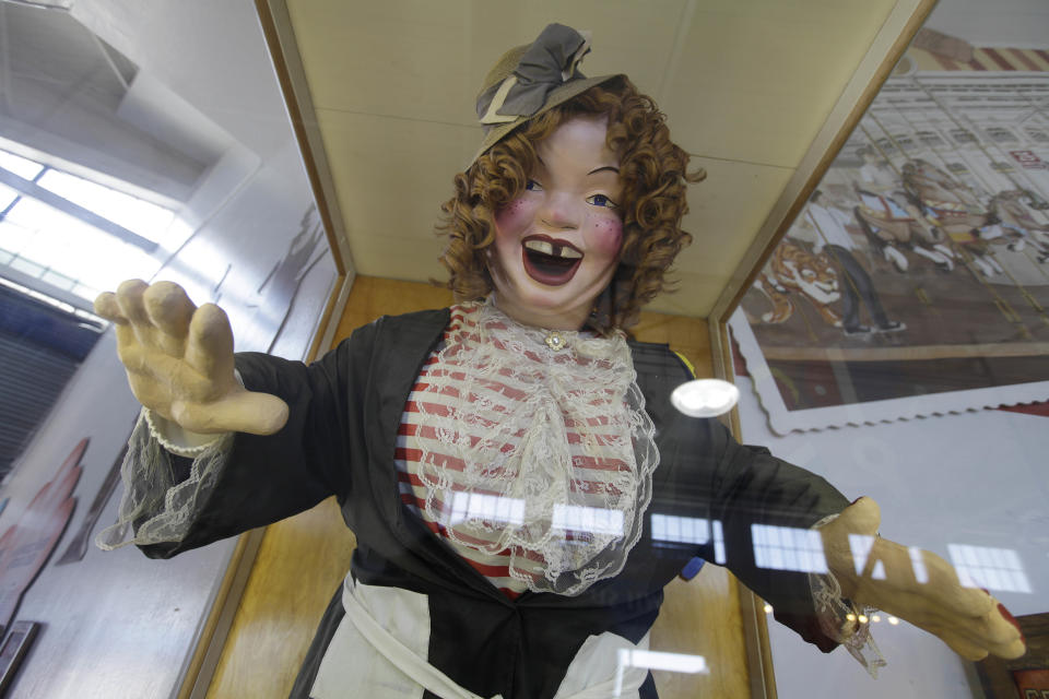 In this photo taken Thursday, May 24, 2012, Laughing Sal is shown at the Musee Mecanique on Fisherman's Wharf in San Francisco. The shrieking and cackling sounds of the haunting figure can be heard throughout the musee. (AP Photo/Eric Risberg)