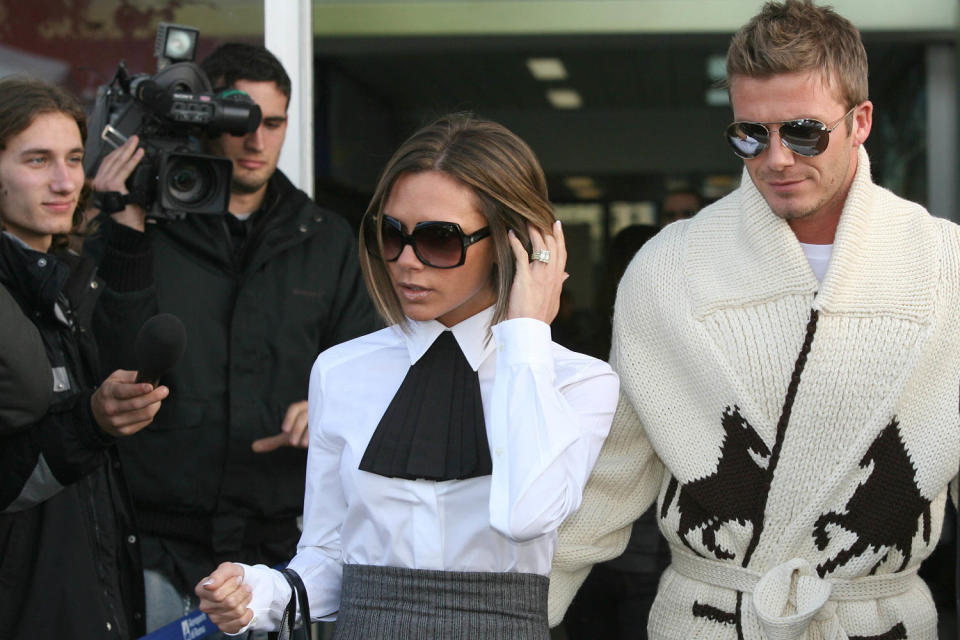 David and Victoria Beckham arrive at Ciampino Airport for Katie Holmes and Tom Cruise wedding at Bracciano on November 17, 2006 in Rome, Italy. (Giuseppe Cacace / Getty Images)