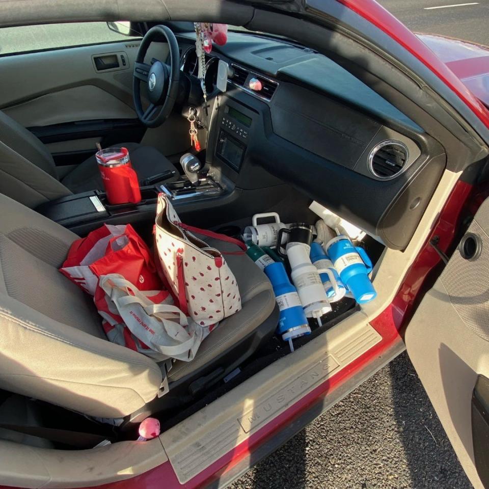 "Staff saw a woman take a shopping cart full of Stanley water bottles without paying for them," said the police.