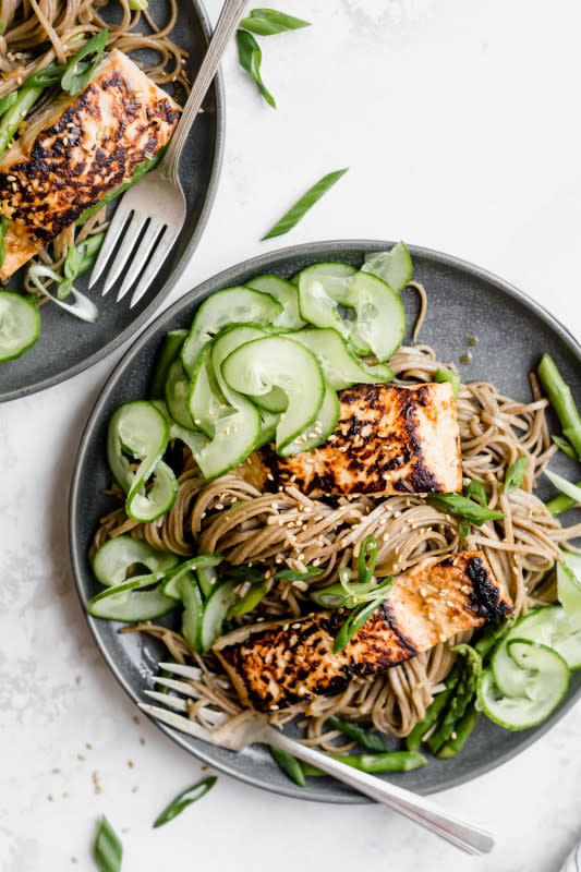 <p>Topped with crisp pan-seared lemongrass salmon, tossed with fresh asparagus and spiralized cucumbers, this salad is not only healthy, but incredibly easy and perfect for busy weeknights.</p><p><strong>Get the recipe: <a href="https://well-fedsoul.com/lemongrass-soba-noodle-salad-with-salmon-asparagus/" rel="nofollow noopener" target="_blank" data-ylk="slk:Lemongrass Soba Noodle Salad with Salmon Asparagus;elm:context_link;itc:0;sec:content-canvas" class="link "><em>Lemongrass Soba Noodle Salad with Salmon Asparagus</em></a></strong></p>