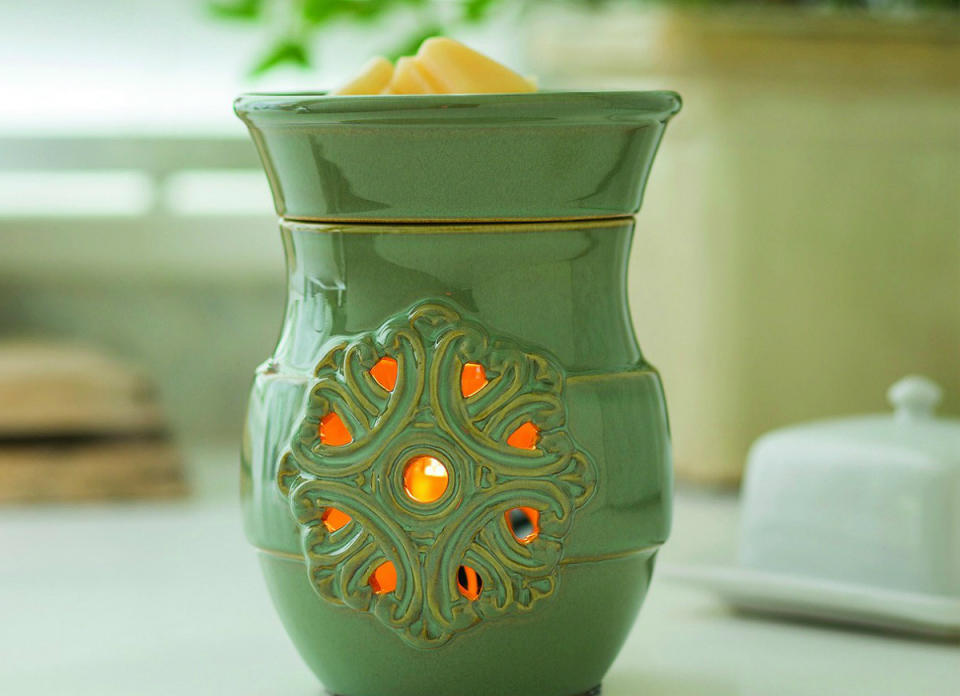 <body> <p>Scented wax warmers have become popular in recent years, but <a rel="nofollow noopener" href=" http://www.bobvila.com/slideshow/9-zero-dollar-diy-organizing-solutions-49179?bv=yahoo" target="_blank" data-ylk="slk:you don’t have to spend money;elm:context_link;itc:0;sec:content-canvas" class="link ">you don’t have to spend money</a> on pricey melts. If you have old scented candles, cut them into small squares and use them in your wax warmer to allow you to enjoy your favorite scent even after the wick is gone.</p> <p><strong>Related: <a rel="nofollow noopener" href=" http://www.bobvila.com/slideshow/7-super-simple-ways-to-make-your-house-smell-fresh-49459?bv=yahoo" target="_blank" data-ylk="slk:7 Super Simple Ways to Make Your House Smell Fresh;elm:context_link;itc:0;sec:content-canvas" class="link ">7 Super Simple Ways to Make Your House Smell Fresh</a> </strong> </p> </body>