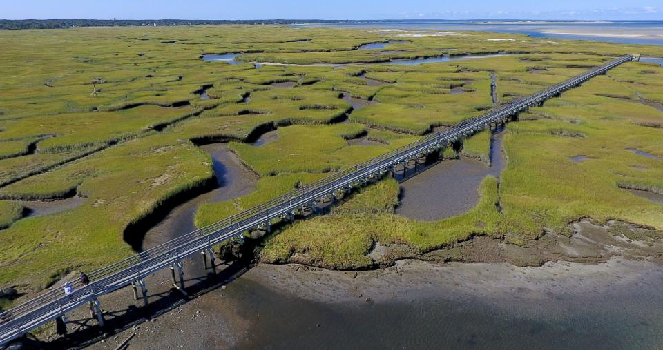 YARMOUTH PORT--A summer day at the Grays Beach boardwalk.