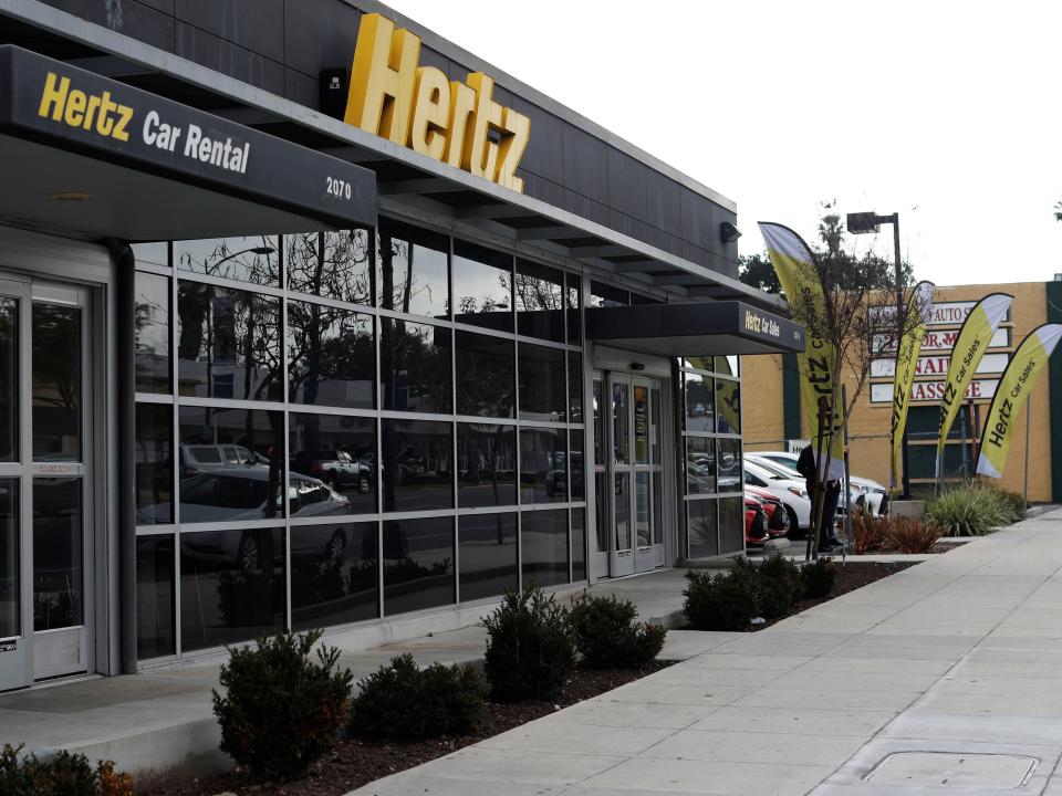 FILE PHOTO: A Hertz rental car location is pictured in Pasadena, California U.S., February 28, 2017.   REUTERS/Mario Anzuoni