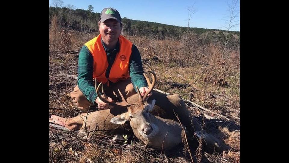 Deer hunter Tyler Hardy says he was bitten on the head by a copperhead coiled in a tree.