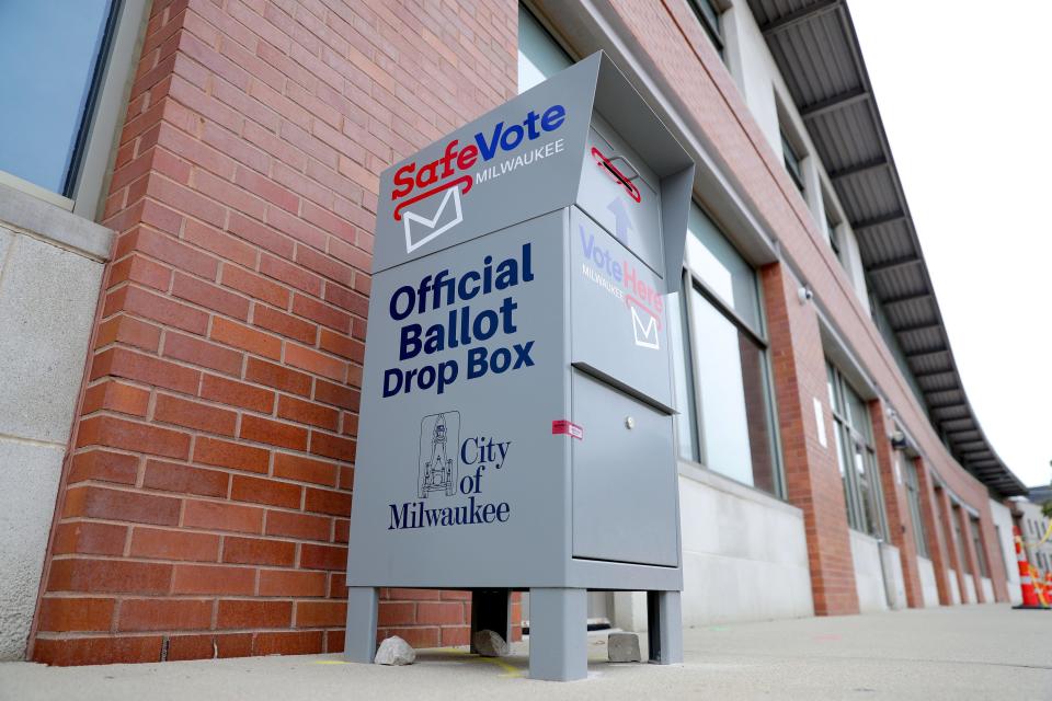 A ballot drop box on the sidewalk outside the Washington Park Library on 2121 N. Sherman Blvd. in Milwaukee on Saturday, Oct. 3, 2020.