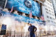 Sir Richard Branson stands outside the New York Stock Exchange (NYSE) ahead of Virgin Galactic's IPO in New York