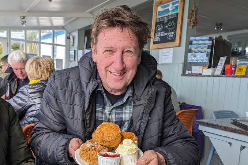 Martin Hesp enjoys a cream tea at the Lizard