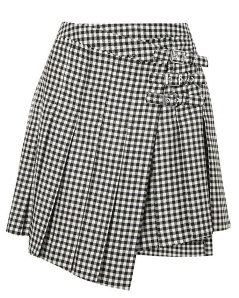 MCQ Alexander McQueen, b<span>uy now for </span><a rel="nofollow noopener" href="https://www.net-a-porter.com/gb/en/product/989278/mcq_alexander_mcqueen/pleated-gingham-wool-twill-wrap-mini-skirt" target="_blank" data-ylk="slk:£385;elm:context_link;itc:0;sec:content-canvas" class="link ">£385</a>