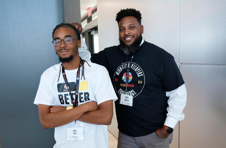 DeAndre Martin, left, and Dr. Quintin Hughes are pictured July 28 at the Northeast OKC Renaissance PlaceKeepers Minority Developers Conference.