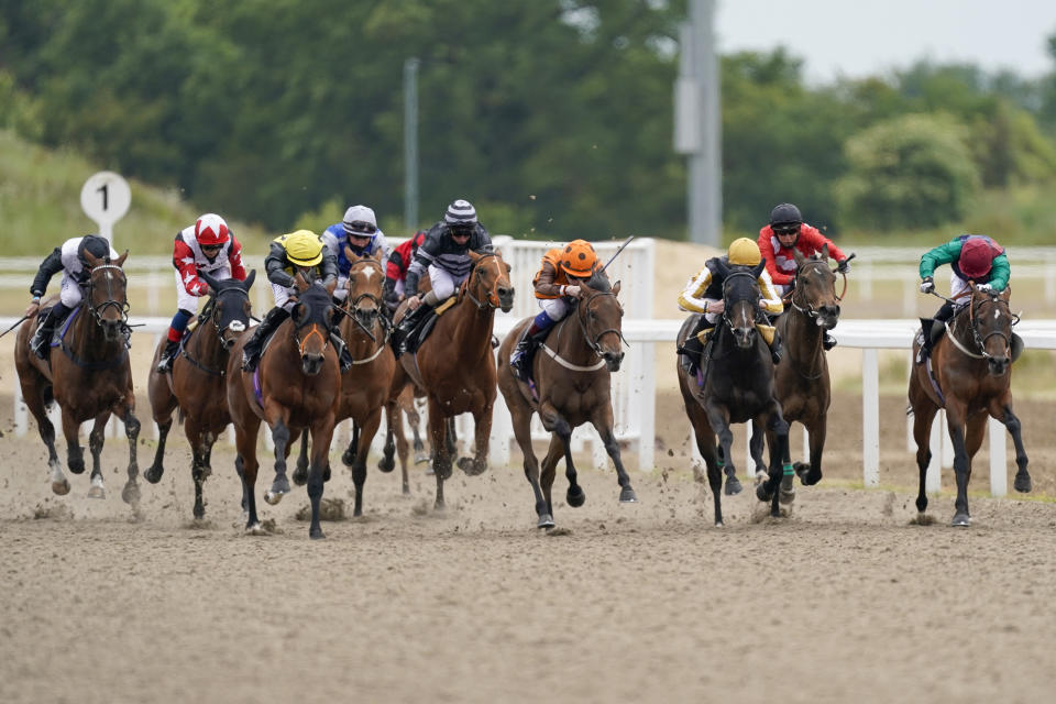 CHELMSFORD, ENGLAND - JUNE 08: David Egan riding Queen of Silca (orange) win The Chelmsford Handicap at Chelmsford City Racecourse on June 08, 2020 in Chelmsford, England. (Photo by Alan Crowhurst/Getty Images)