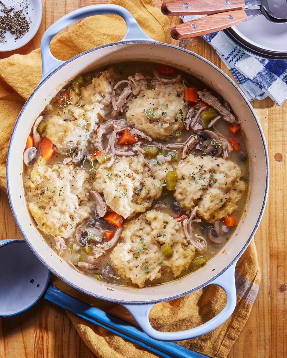 easy weeknight chicken and dumplings in a light blue dutch oven