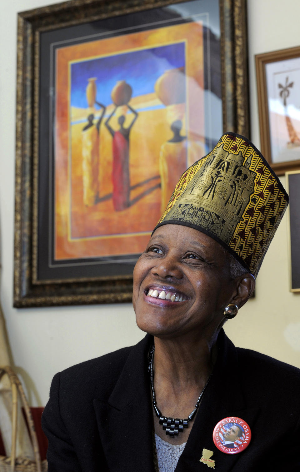 In this Feb. 17, 2010, photo, Sadie Roberts-Joseph, founder of the Odell S. Williams Now and Then Museum of African-American History, now known as the Baton Rouge African-American History Museum, poses for a portrait wearing an Egyptian headdress, in Baton Rouge, La. East Baton Rouge Coroner Beau Clark released preliminary autopsy results Monday, July 15, 2019, that show Roberts-Joseph, 75, was suffocated to death before her body was found in the trunk of a car over the weekend. (Travis Spradling/The Advocate via AP)