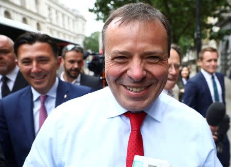 FILE PHOTO: Arron Banks and Andy Wigmore, who ran the Leave.Eu pro-Brexit referendum campaign, arrive to give evidence to the Digital Culture Media and Sport Parliamentary Committee in London, Britain, June 12, 2018. REUTERS/Simon Dawson