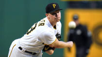 Pittsburgh Pirates starting pitcher Mitch Keller delivers during the first inning of the team's baseball game against the Cincinnati Reds in Pittsburgh, Tuesday, Sept. 27, 2022. (AP Photo/Gene J. Puskar)