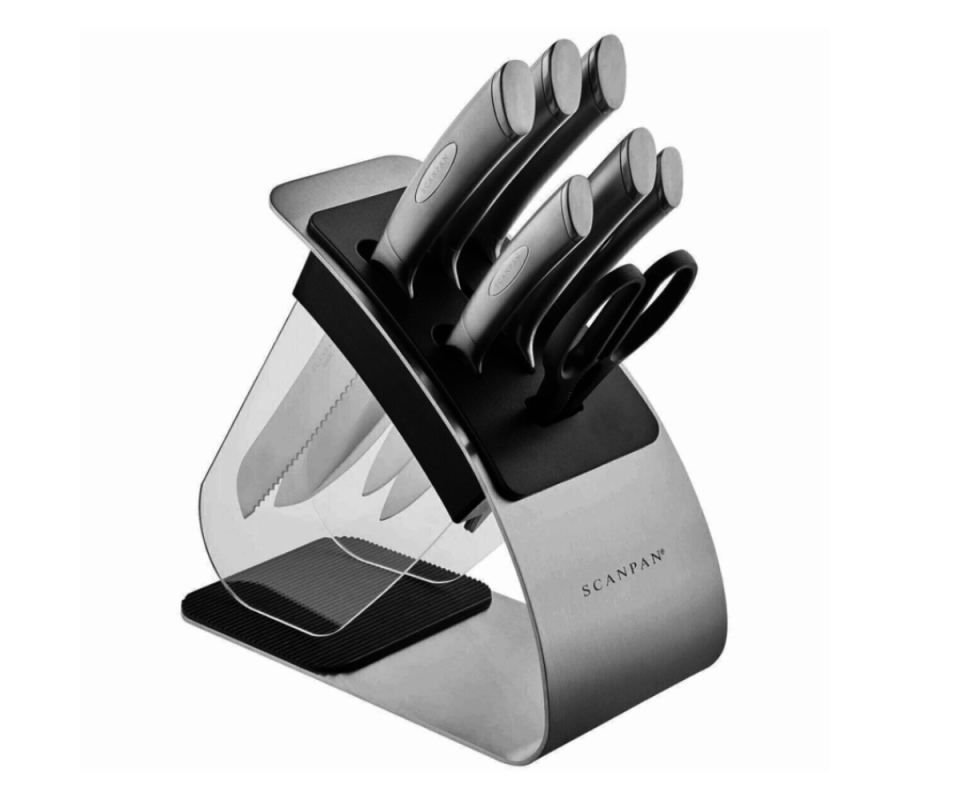 The scanpan knife set sits in the bolster on an angle against a white background.