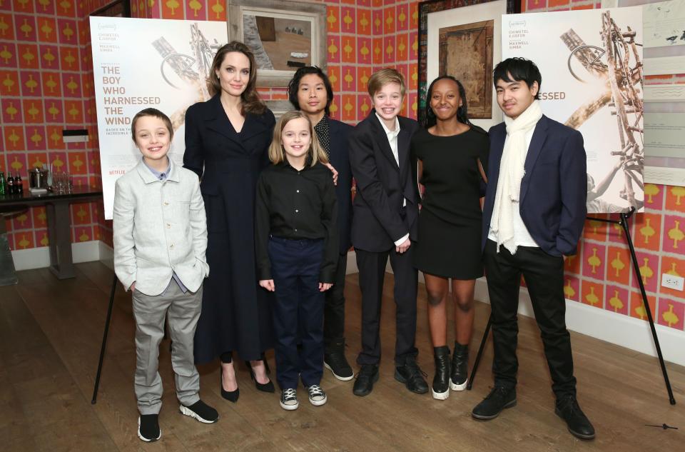 NEW YORK, NEW YORK - FEBRUARY 25: Angelina Jolie with children Knox Leon Jolie-Pitt, Vivienne Marcheline Jolie-Pitt, Pax Thien Jolie-Pitt, Shiloh Nouvel Jolie-Pitt, Zahara Marley Jolie-Pitt and Maddox Chivan Jolie-Pitt attend "The Boy Who Harnessed The Wind" Special Screening at Crosby Street Hotel on February 25, 2019 in New York City. (Photo by Monica Schipper/Getty Images for Netflix) ORG XMIT: 775291341 ORIG FILE ID: 1132179340