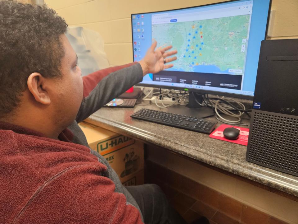 Mississippi State University Professor Jesse Goliath shows the database he built for people in Mississippi who are missing and bodies that are unidentified. To date, there are more than 1,000 names entered in the database.