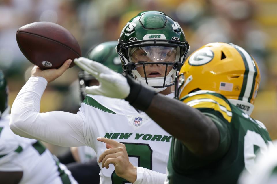 New York Jets' Zach Wilson throws during the first half of a preseason NFL football game against the Green Bay Packers Saturday, Aug. 21, 2021, in Green Bay, Wis. (AP Photo/Matt Ludtke)
