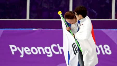 Feb 18, 2018; Pyeongchang, South Korea; Nao Kodaira (JPN) and Sang-Hwa Lee (KOR) celebrates after the women's speed skating 500m during the Pyeongchang 2018 Olympic Winter Games at Gangneung Ice Arena. Mandatory Credit: Dan Powers-USA TODAY Sports