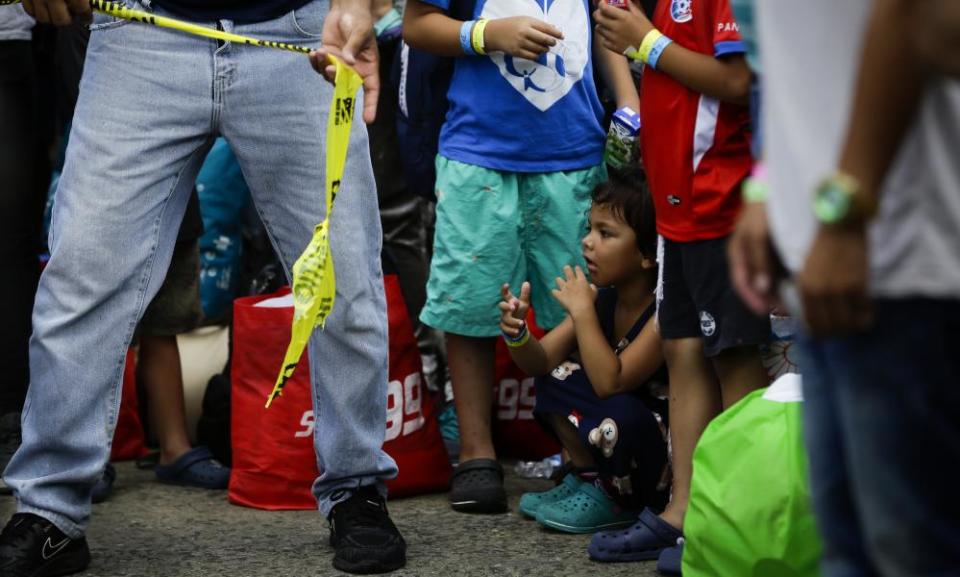 Venezuelans wait in a temporary shelter to be sent to their country of origin, after crossing the Darien Gap, in Panama City.