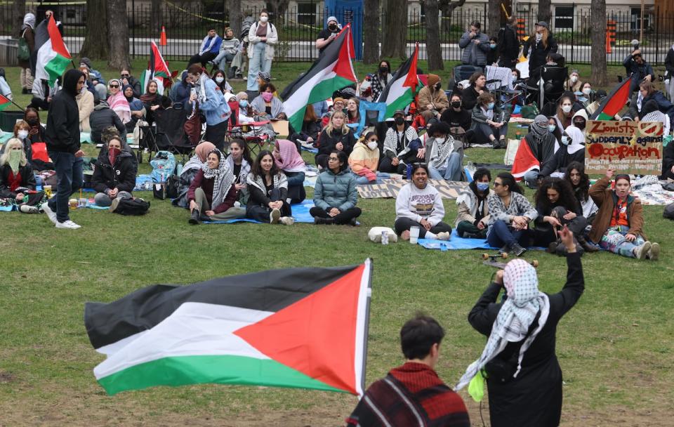 Pro-Palestinian supporters take part in a sit-in at the University of Ottawa, in Ottawa on Monday, April 29, 2024. 