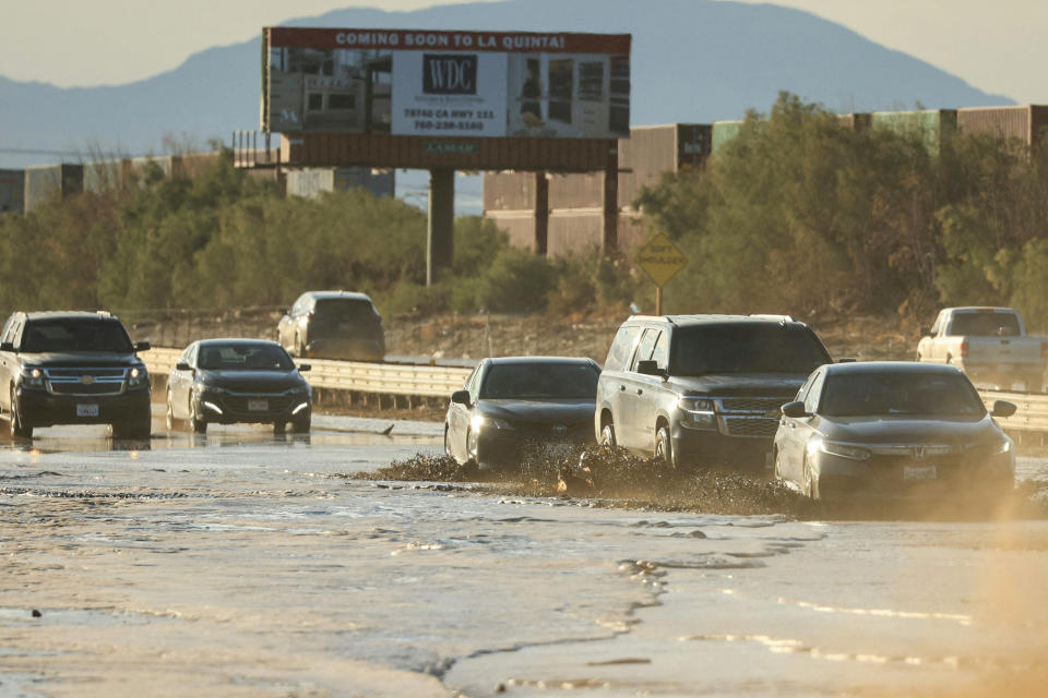 Traffic is slowed as water and mud from Tropical Storm Hilary covers part of Interstate 10 between Indio and Palm Springs, Calif., on Aug. 21, 2023. (David Swanson / AFP - Getty Images)