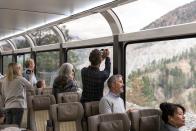 <p>With its unique glass-domed fleet, 180-degree views of the sky and reclining seats, the <a href="https://www.goodhousekeepingholidays.com/tours/canada-rocky-mountaineer" rel="nofollow noopener" target="_blank" data-ylk="slk:Rocky Mountaineer train;elm:context_link;itc:0;sec:content-canvas" class="link ">Rocky Mountaineer train</a> gives you the best, most comfortable views of Western Canada and Western USA. You can spot Fraser Canyon, Kinbasket Lake, Pyramid Falls, or Ruby Canyon and Mount Logan among other extraordinary sites that can be witnessed from on-board one of the train’s four routes.</p>