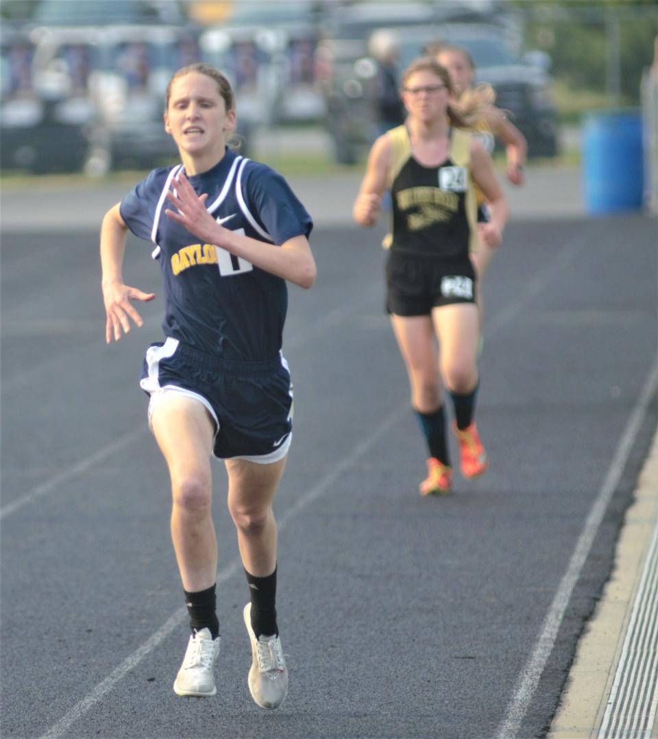 Katie Berkshire leads the pack in the 1600m run during the MHSAA Regional 11-2 track meet on Friday, May 19 at Shepherd High School.