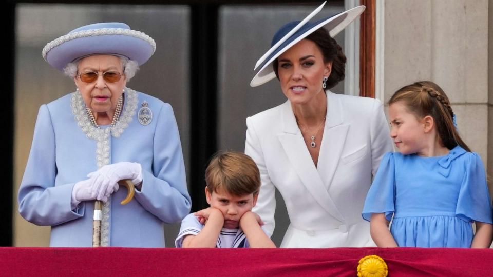 PHOTO: Queen Elizabeth II, Prince Louis, Kate, Duchess of Cambridge, and Princess Charlotte on the balcony of Buckingham Palace, London, June 2, 2022. (Alastair Grant/Pool Photo via AP)