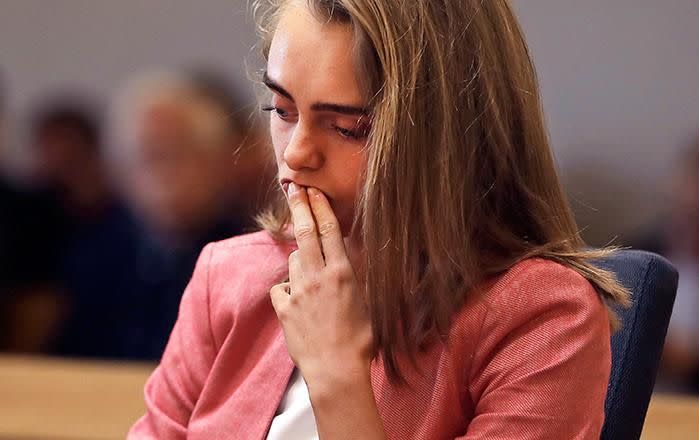 Michelle Carter listens as prosecutor Maryclare Flynn makes her opening statement. Picture: AP