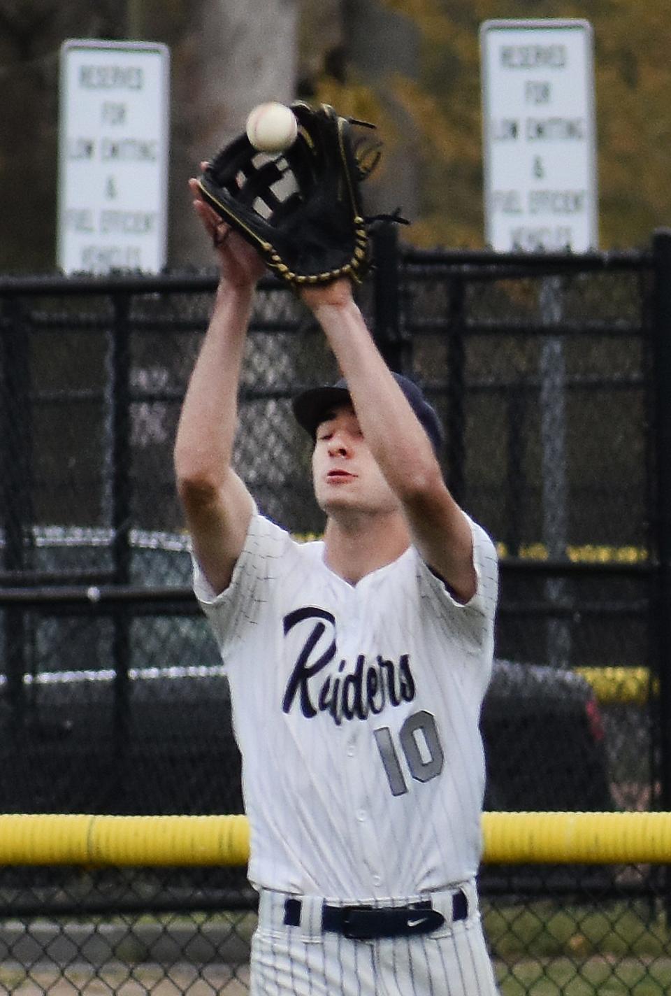 Somerset Berkley's Landon Richardson catches the fly ball in center field.