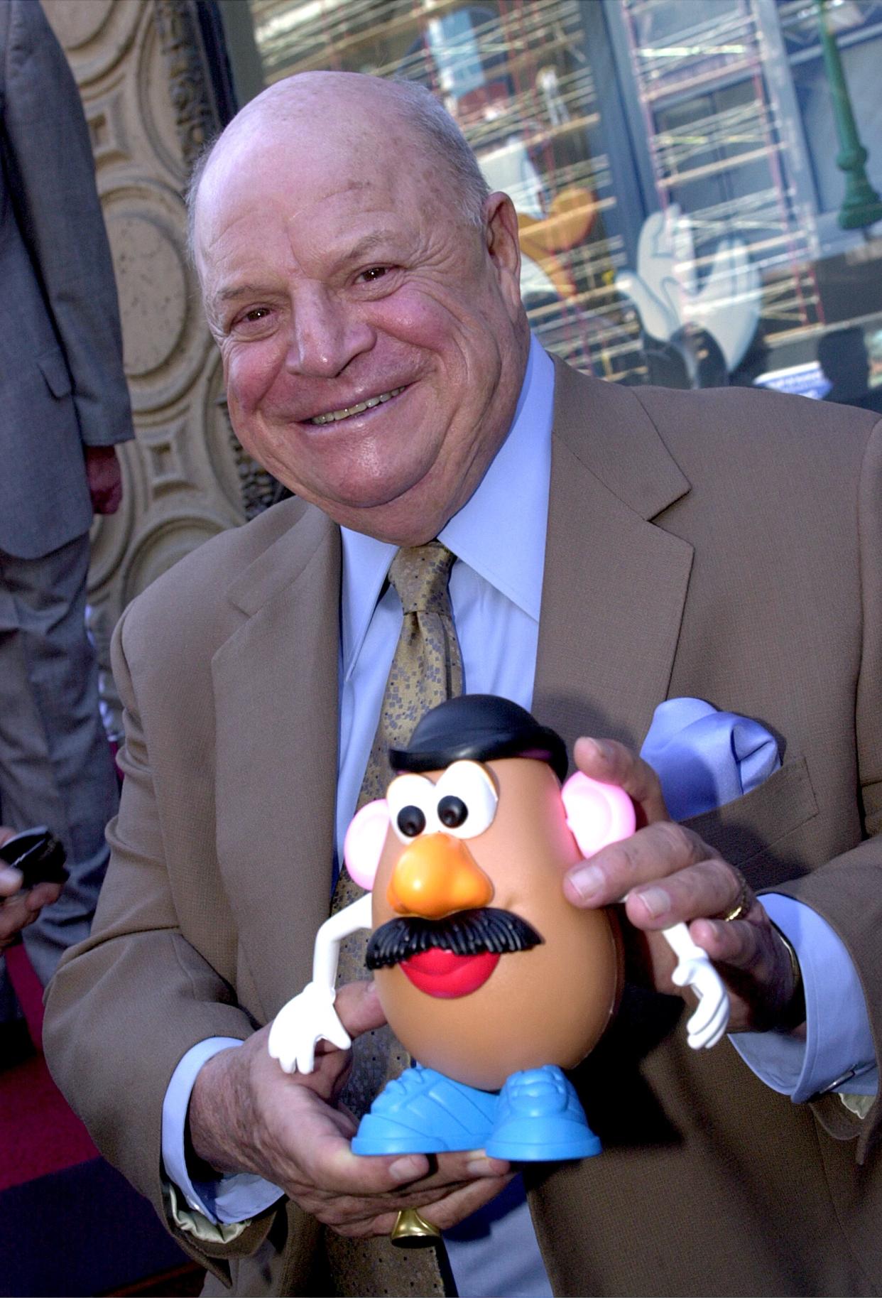 380391 04: Veteran comedian Don Rickles holds a 