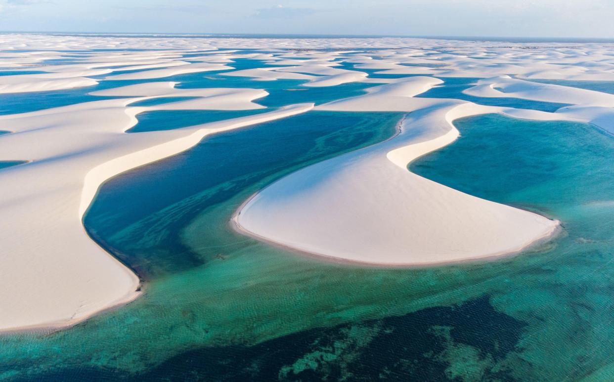 In Lençóis Maranhenses National Park rainwater collects in the dunes to create freshwater lagoons