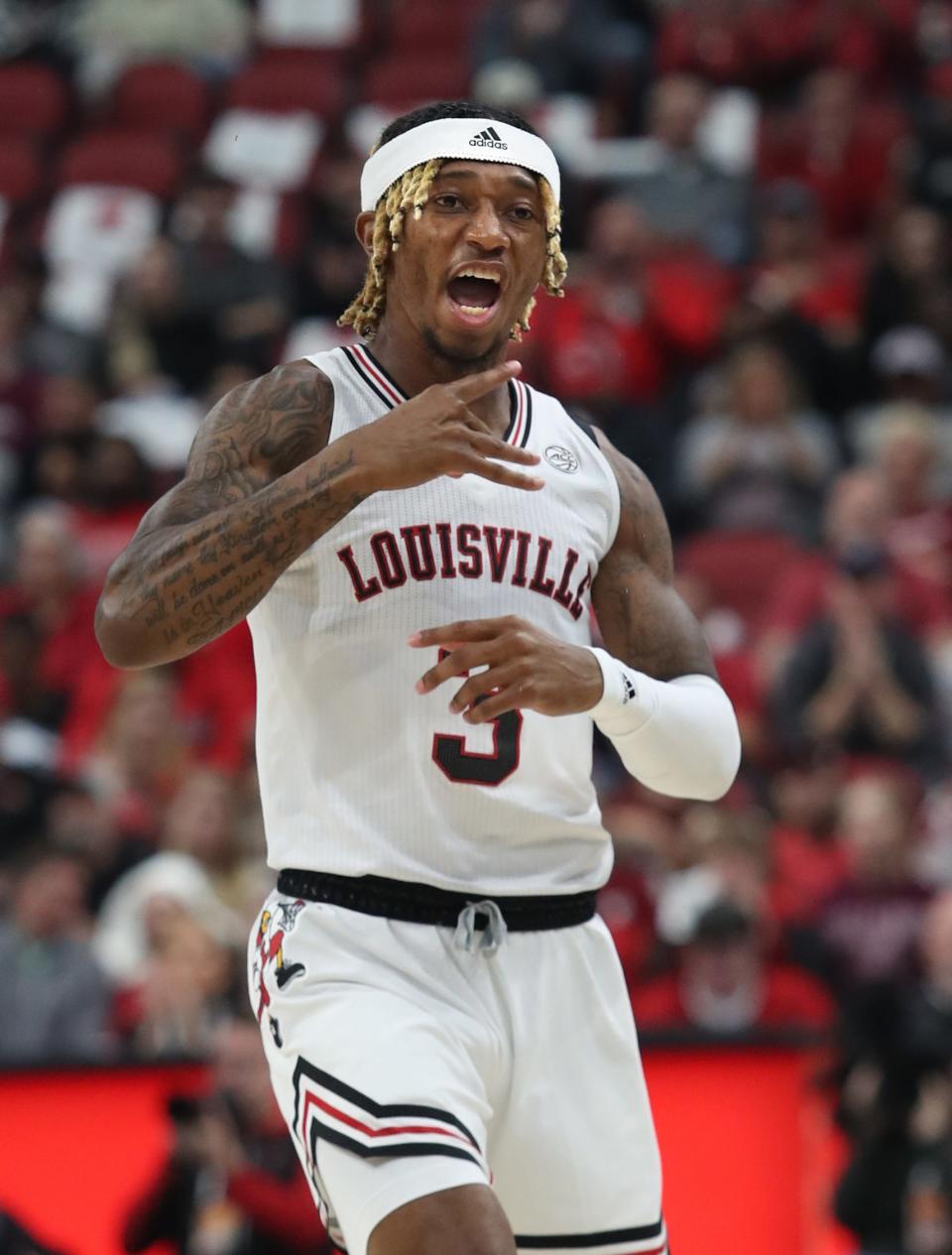 Louisville’s El Ellis celebrates making a basket against Bellarmine.Nov. 9, 2022