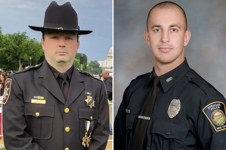 The two “hero” upstate law-enforcement officers killed in a Sunday night shootout with an AR-15-wielding madman have been identified as Syracuse cop Michael Jensen and decorated Onondaga County Sheriff's Deputy and married dad of three Michael Hoosock.