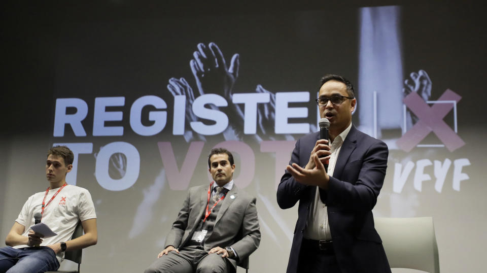 Labour councillor Abdul Hal, right, speaks alongside Hector Birchwood, Brexit Party candidate for Holborn and St Pancras, centre, during a Vote For Your Future Hustings at Westminster Kingsway College in London, Tuesday, Nov. 19, 2019. There is a generation of young people who weren't old enough to vote in the Brexit referendum, but those young voters could hold the key to victory in the upcoming Dec. 12 General Election for which-ever party can garner their vote. (AP Photo/Kirsty Wigglesworth)