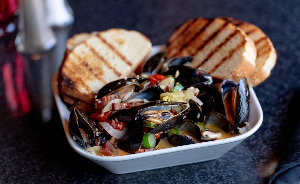 Prince Edward Island mussels with pancetta, roasted tomatoes, shallots, garlic, fennel and a white wine garlic cream broth is on the menu at Cafe Trio in Kansas City.