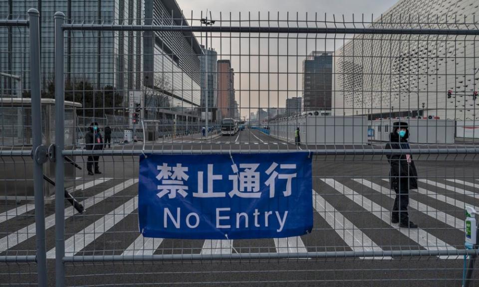 Security guards at the media centre fence 