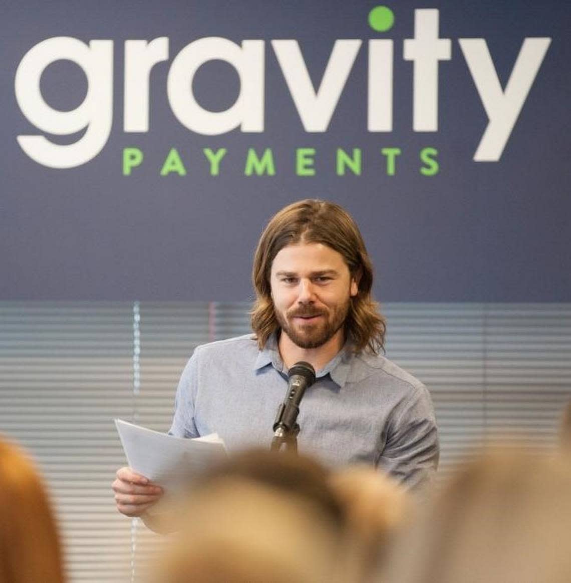 Dan Price, Gravity Payments CEO, pictured at his April 2015 announcement of a $70,000 minimum wage for employees.