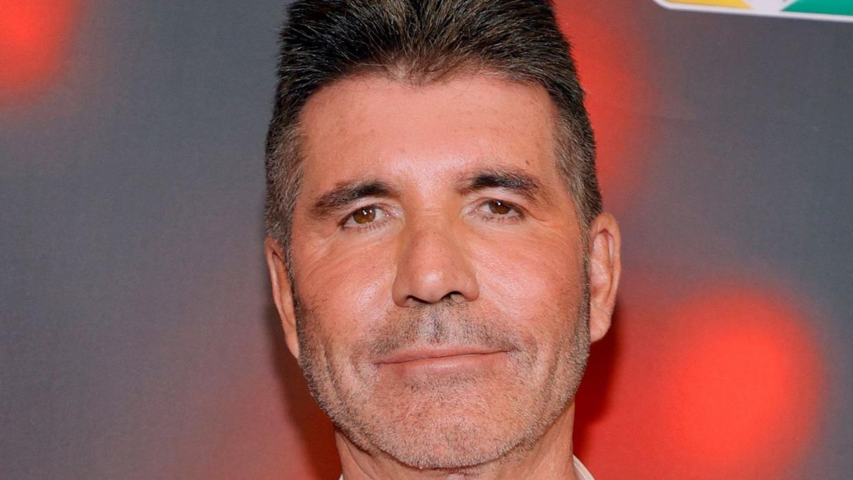 simon cowell in grey suit 