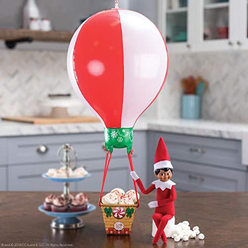 Elf on the Shelf Riding a Hot Air Balloon