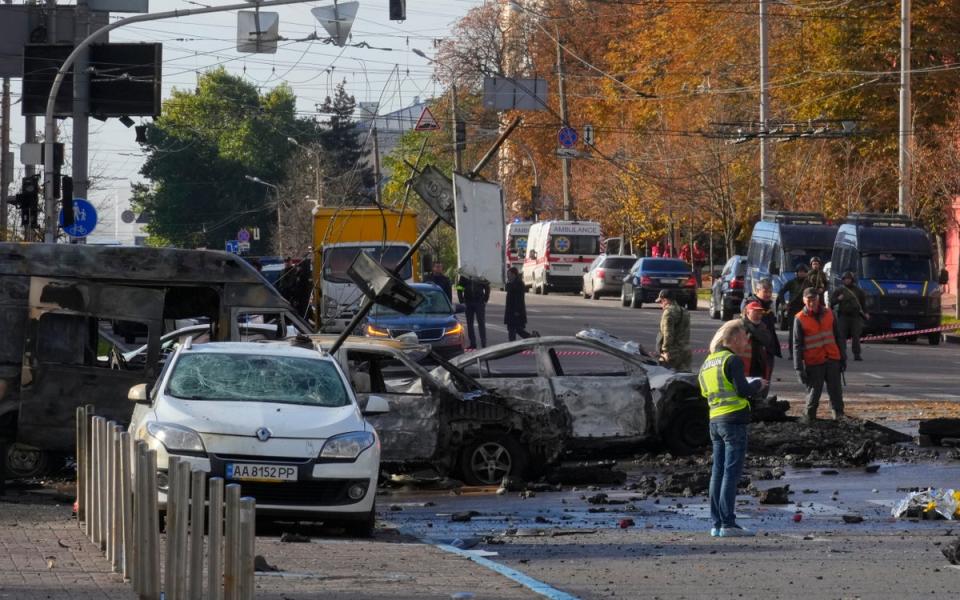 Police inspect the scene of Russian shelling in Kyiv, Ukraine (Copyright 2022 The Associated Press. All rights reserved)