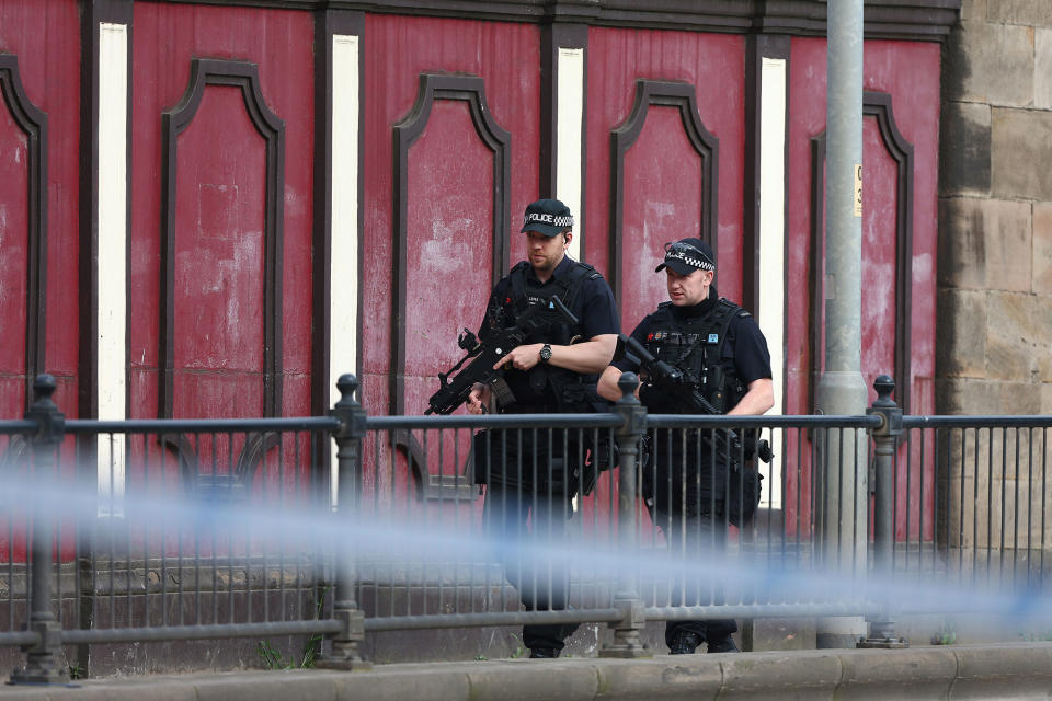 <p>Armed police patrol the streets the morning after a terrorist attack on May 23, 2017 in Manchester, England. (Dave Thompson/Getty Images) </p>