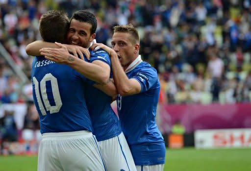 Italian forward Antonio Di Natale (C) celebrates with teammates after scoring during the Euro 2012 championships football match Spain vs Italy at the Gdansk Arena. The match ended in a 1-1 draw