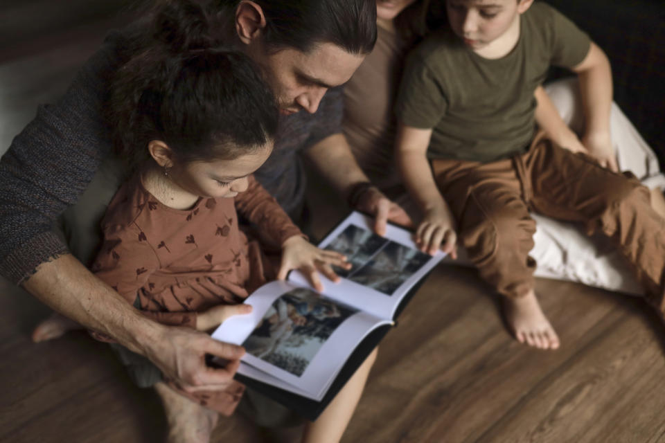 A family looking at photos