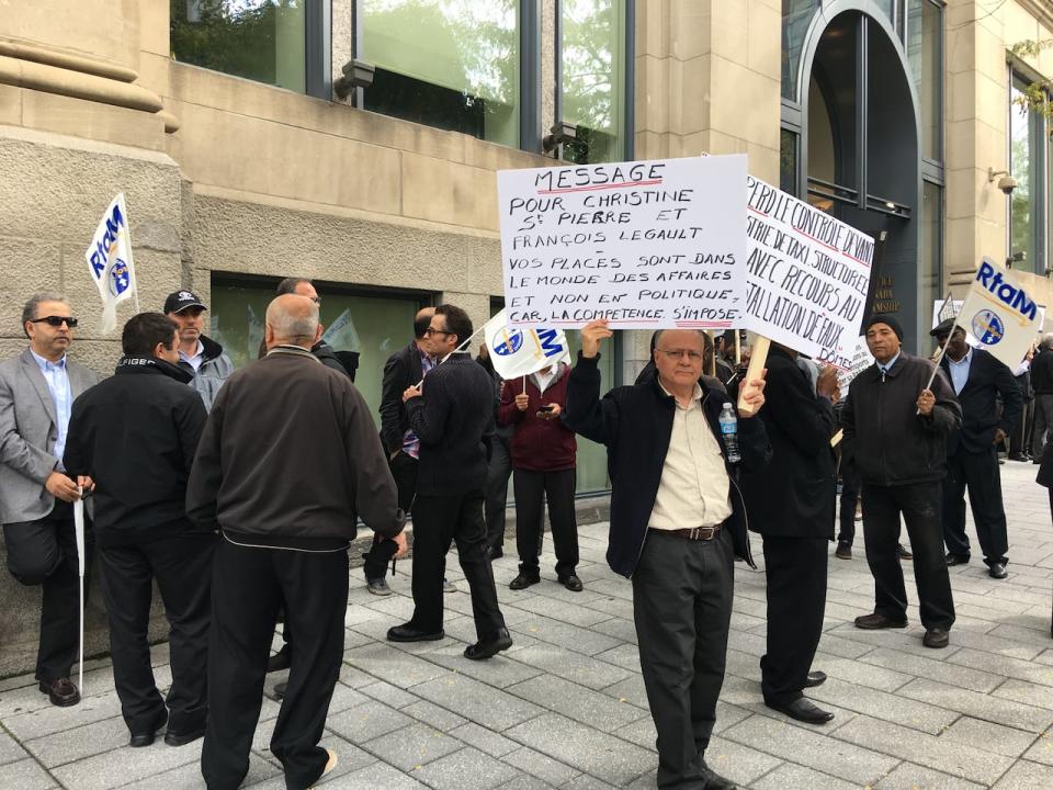 The introduction of ride-sharing services in Quebec led to numerous protests by taxi drivers, as seen here in 2017.